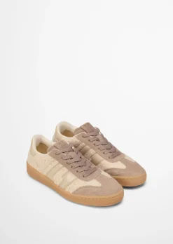 Sneaker Model Court aus Leder und Teddyfell