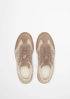 Sneaker Model Court aus Leder und Teddyfell